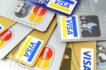 Can You Use Credit Cards to Pay Off Each Other?